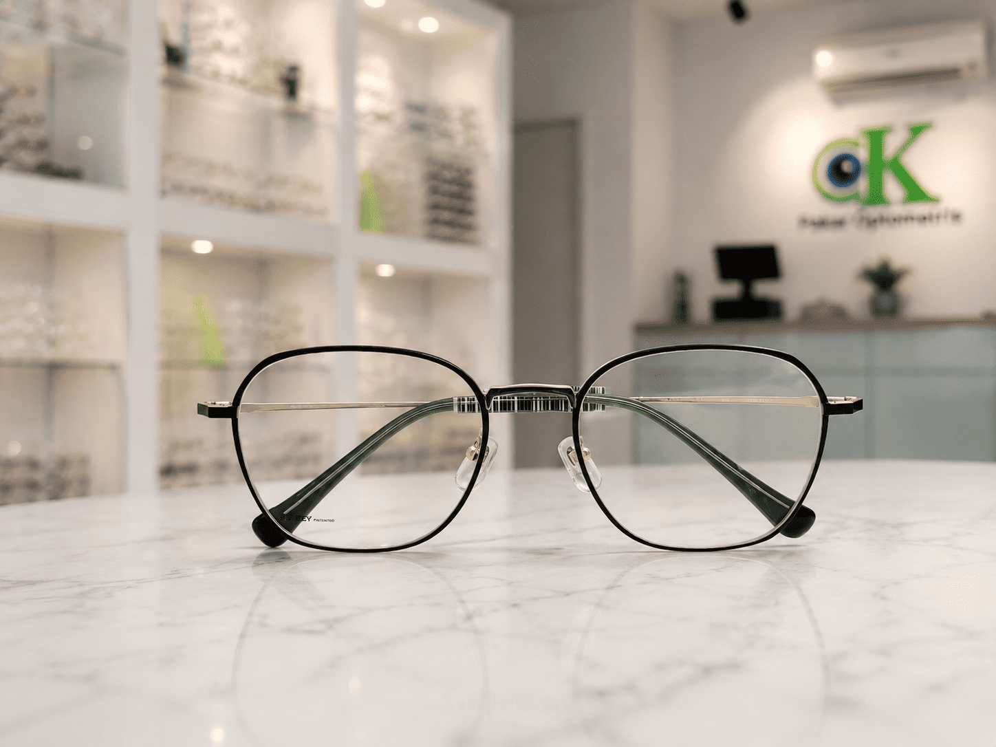 Customer eyewear fitting at CK Optometrist Consultant